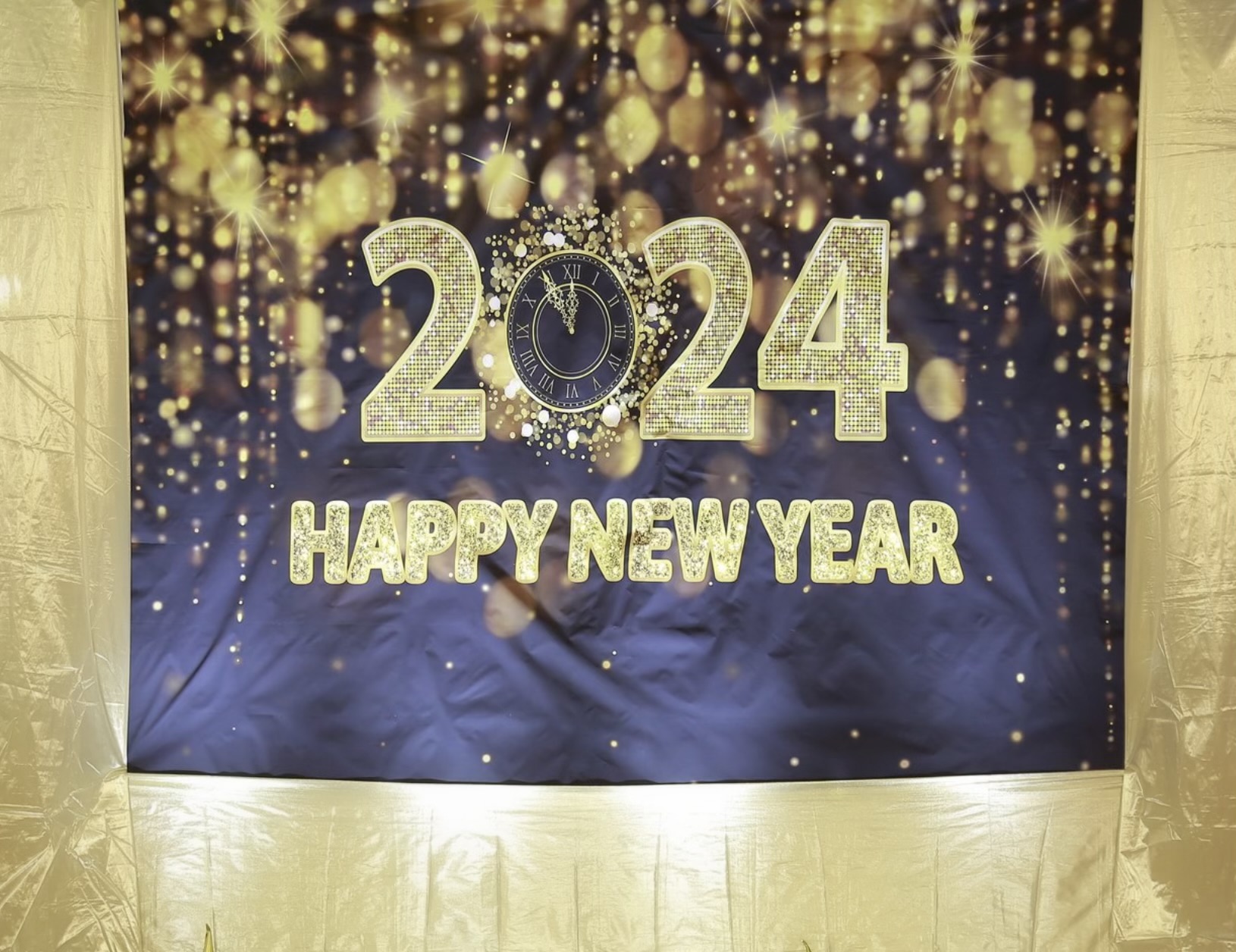 Happy New Year 2024 backdrop with gold lights