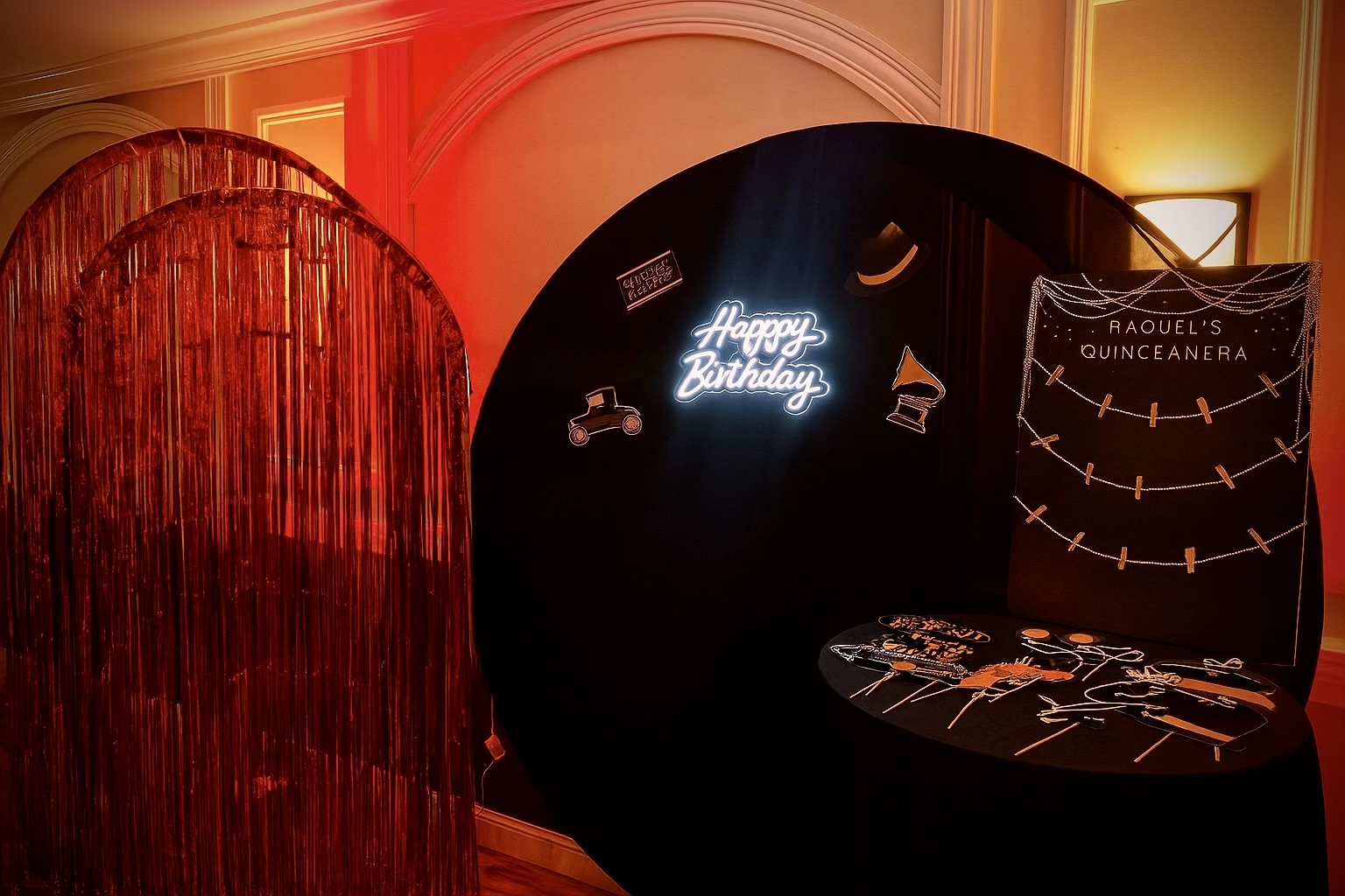 Gatsby-themed vignette with neon sign and props