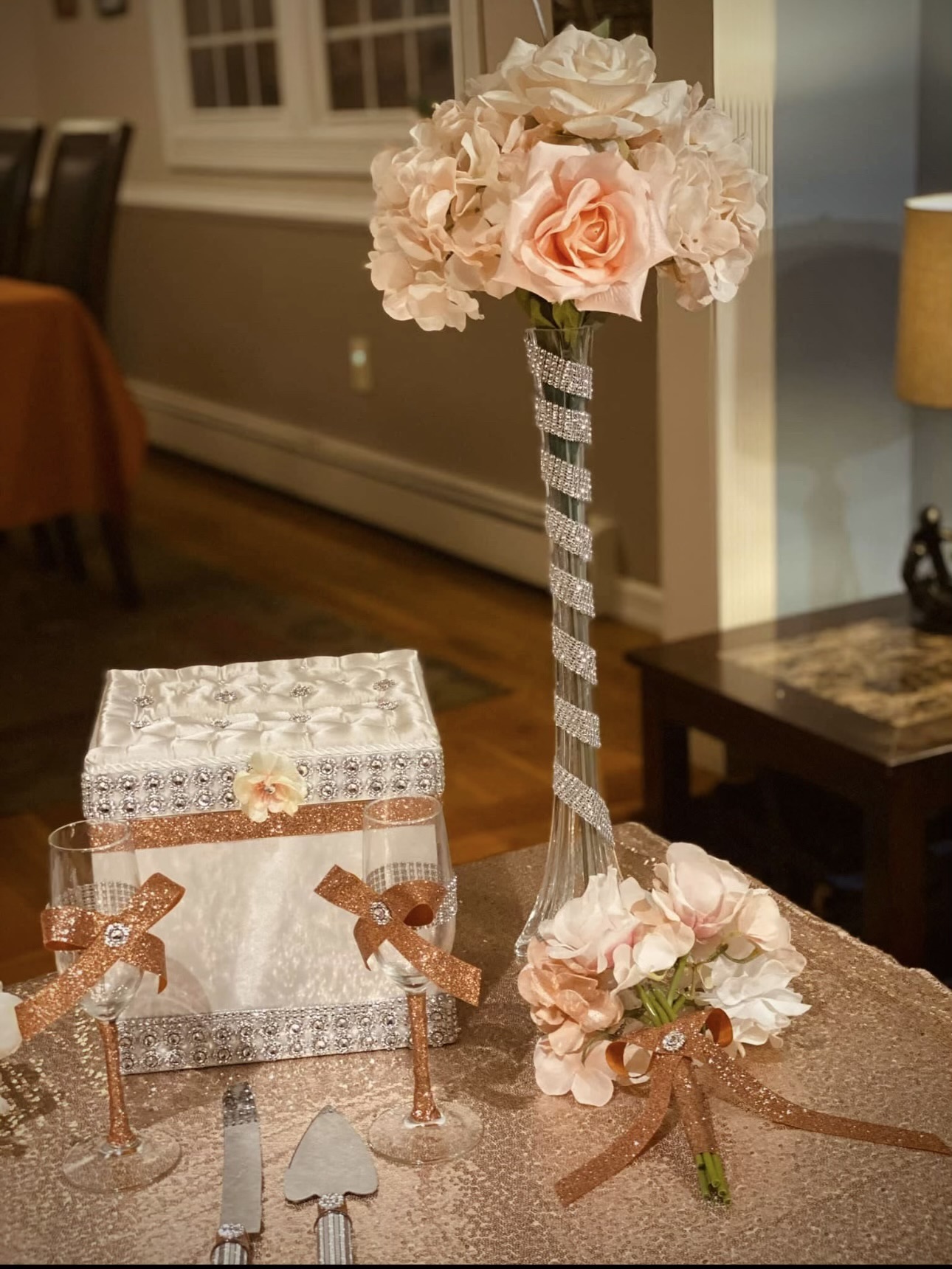 Blush florals and crystal stems on sequin linen