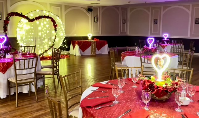 Red & gold room styling with heart backdrops